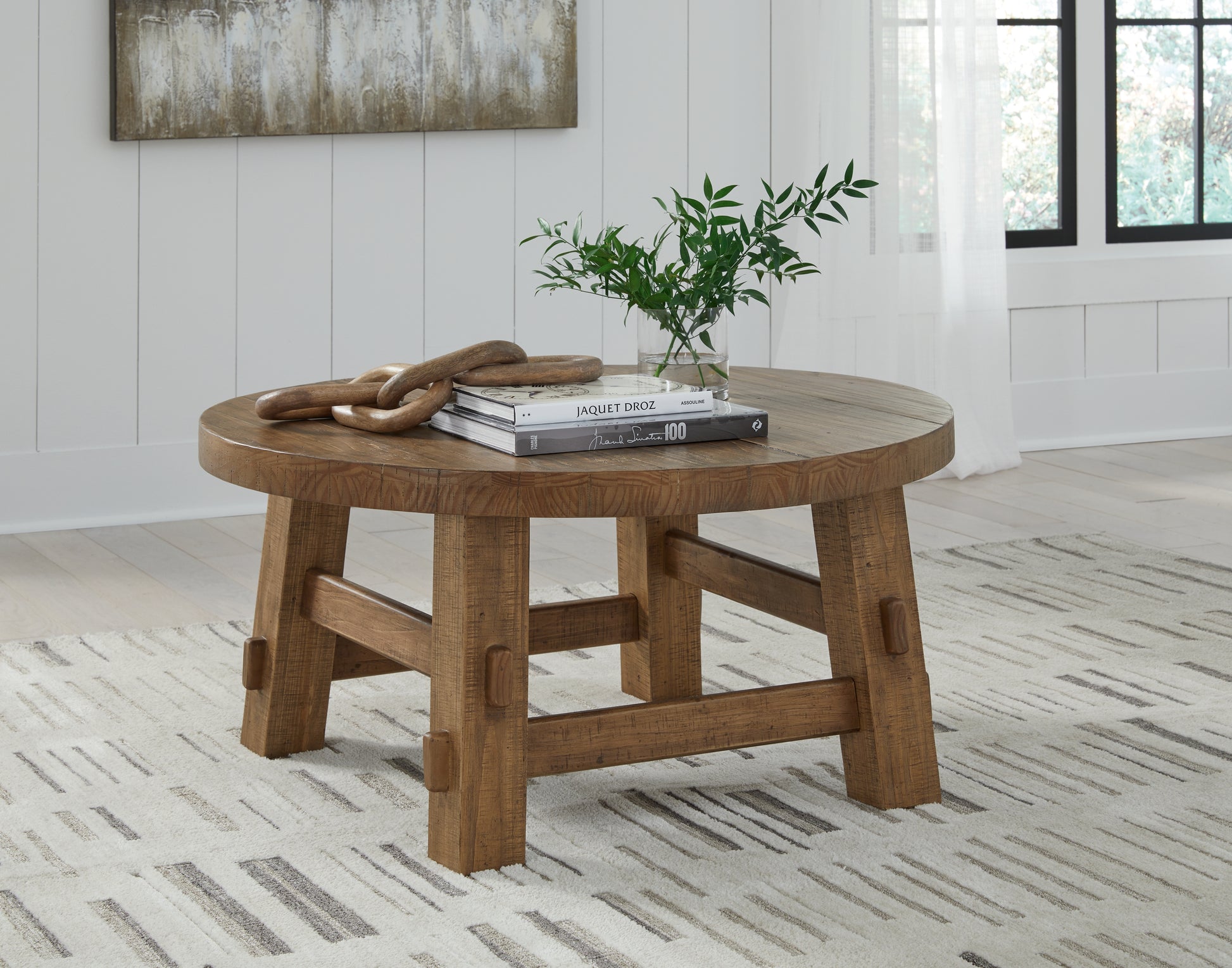 Bradenton Furniture Outlet - Ashley Furniture - Mackifeld Coffee Table - Round Cocktail Table / Warm Brown - T724-8