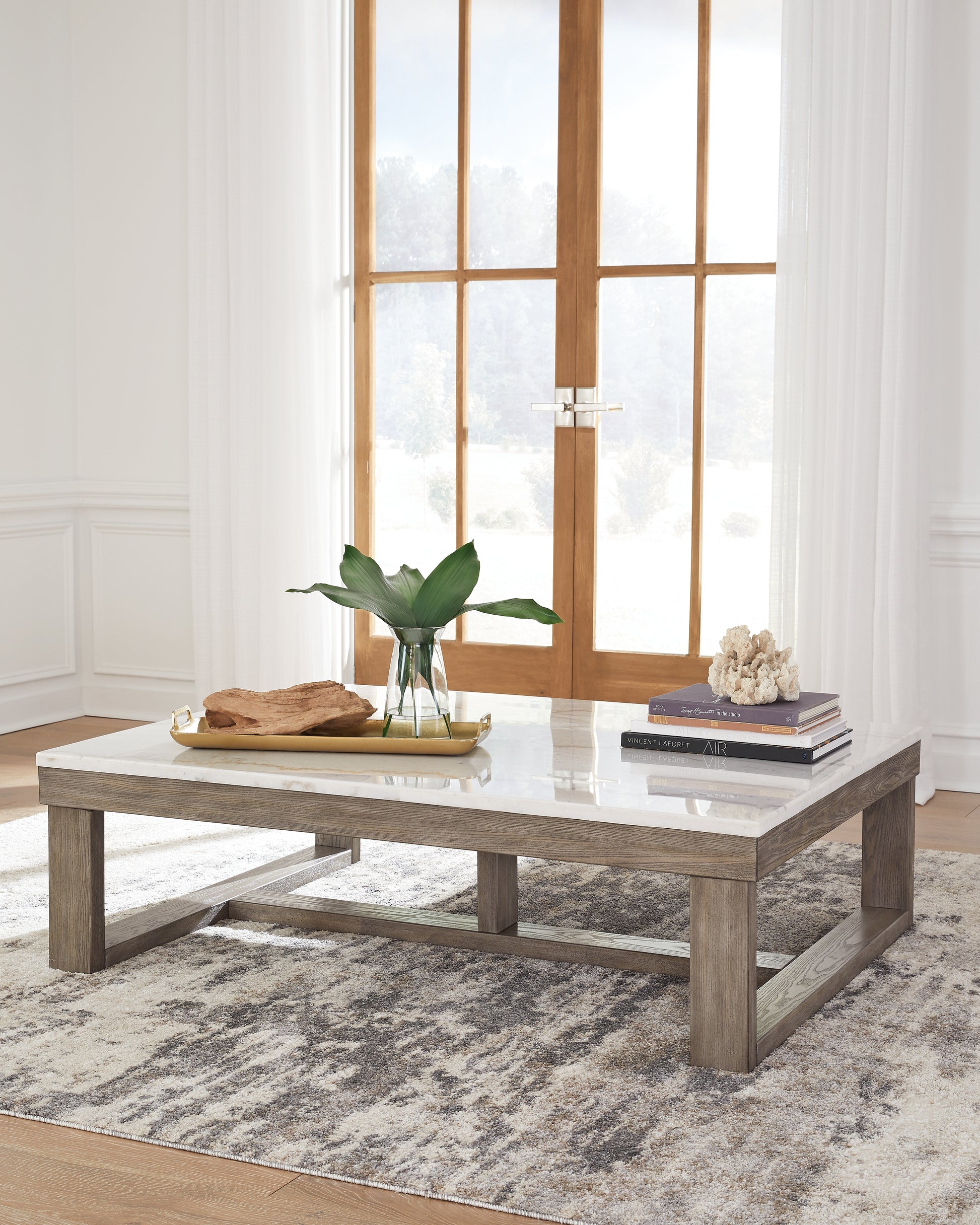 Bradenton Furniture Outlet - Ashley Furniture - Loyaska Coffee Table - Rectangular Cocktail Table / Brown/Ivory - T789-1