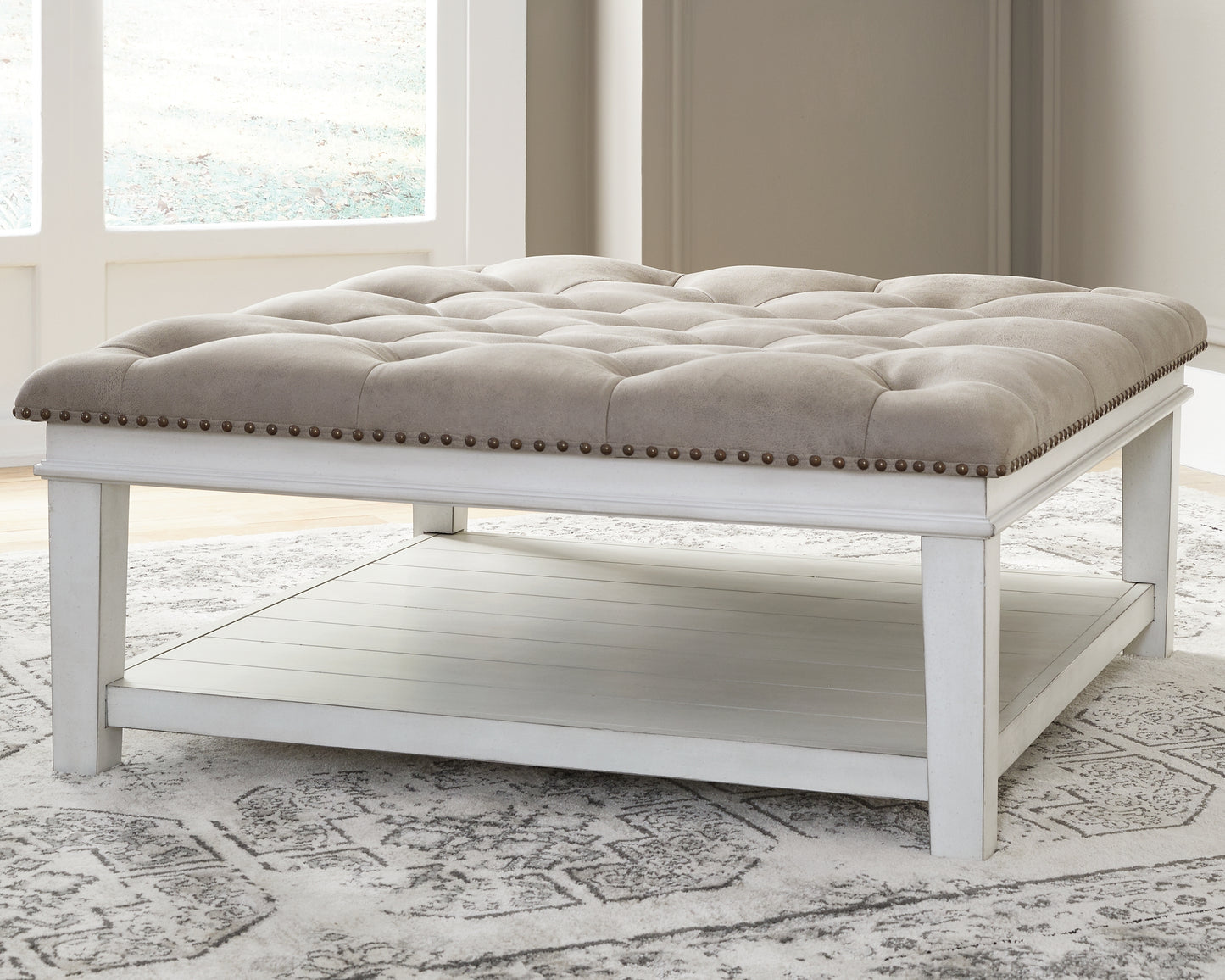 Bradenton Furniture Outlet - Ashley Furniture - Kanwyn Upholstered Ottoman Coffee Table - UPH Ottoman Cocktail Table / Whitewash - T937-21