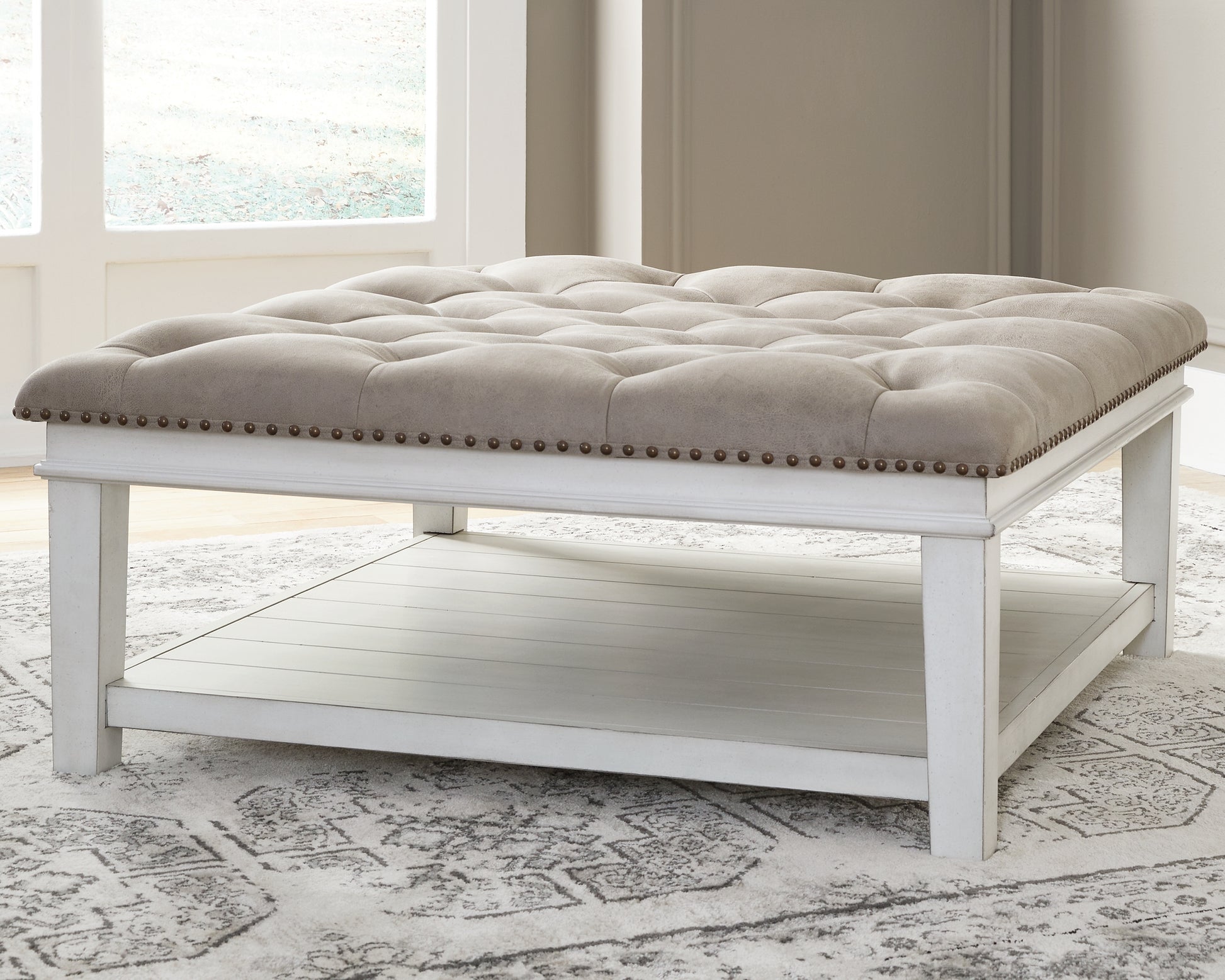 Bradenton Furniture Outlet - Ashley Furniture - Kanwyn Upholstered Ottoman Coffee Table - UPH Ottoman Cocktail Table / Whitewash - T937-21