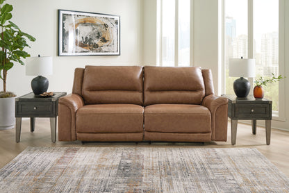 Bradenton Furniture Outlet - Ashley Furniture - Trasimeno Living Room - 2 Seat PWR REC Sofa ADJ HDREST / Caramel - U8281547