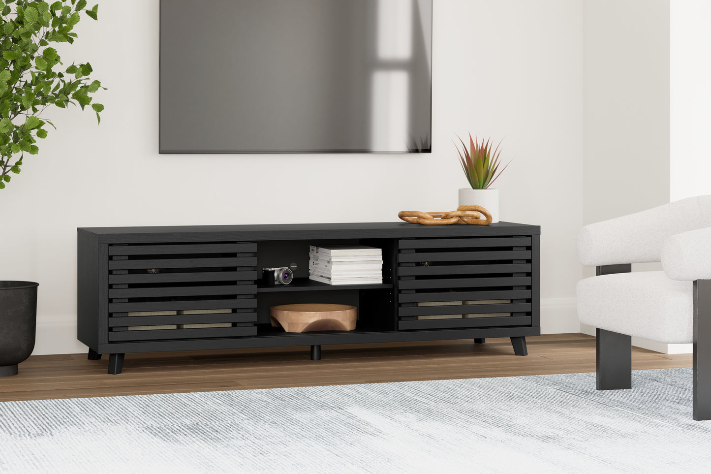 Bradenton Furniture Outlet - Ashley Furniture - Danziar TV Stand - 72" / Black - W1013-68