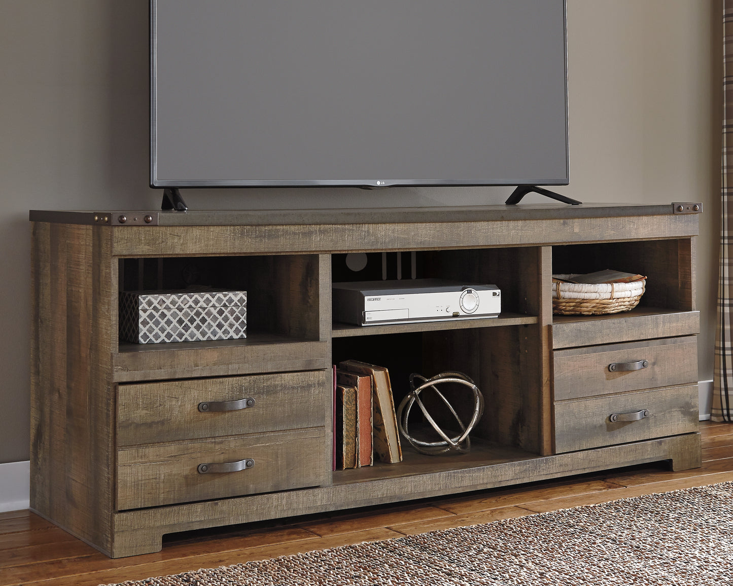Bradenton Furniture Outlet - Ashley Furniture - Trinell TV Stand - 63" / Brown - W446-68