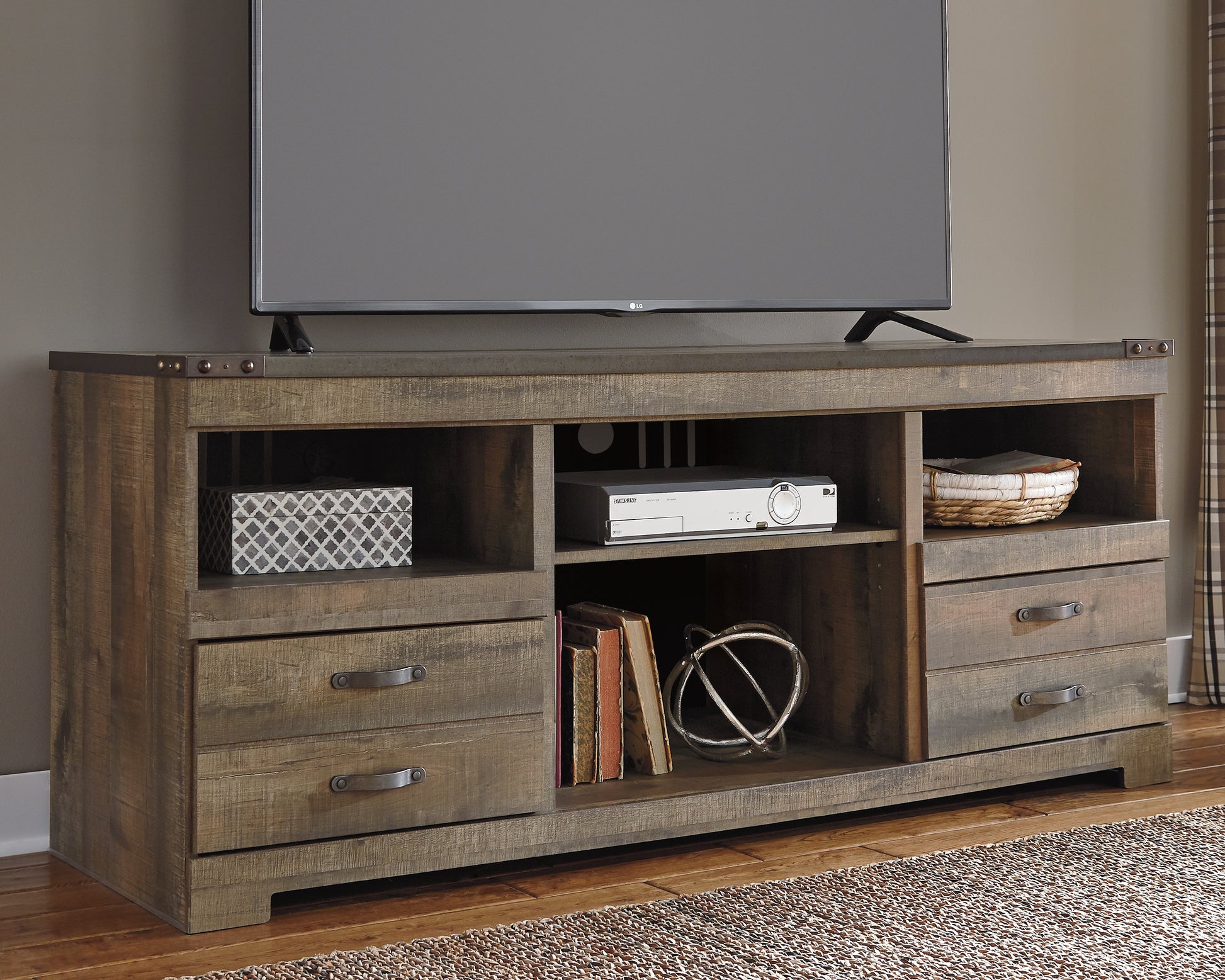 Bradenton Furniture Outlet - Ashley Furniture - Trinell TV Stand - 63" / Brown - W446-68