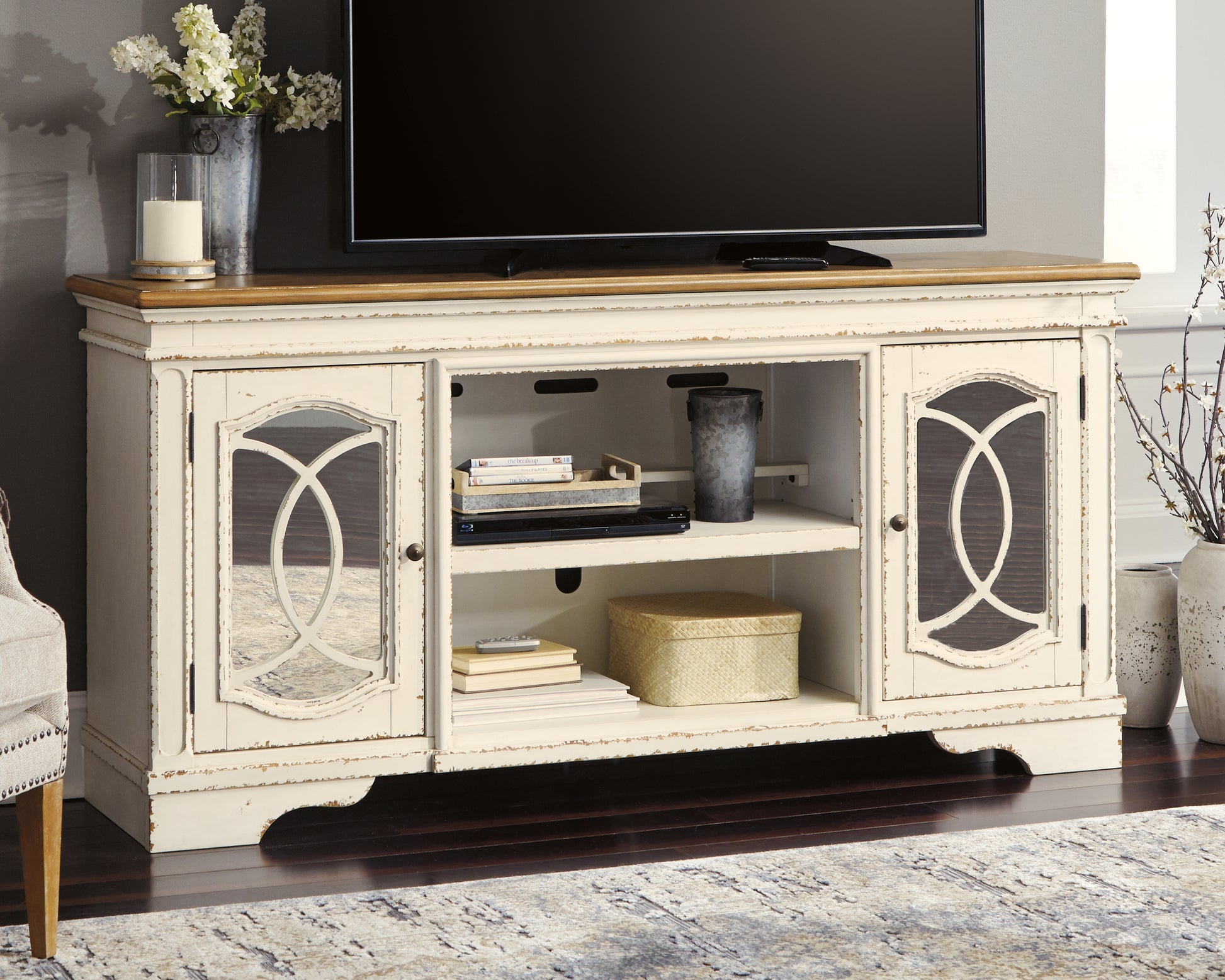 Bradenton Furniture Outlet - Ashley Furniture - Realyn 74" TV Stand - 74" / Chipped White - W743-68