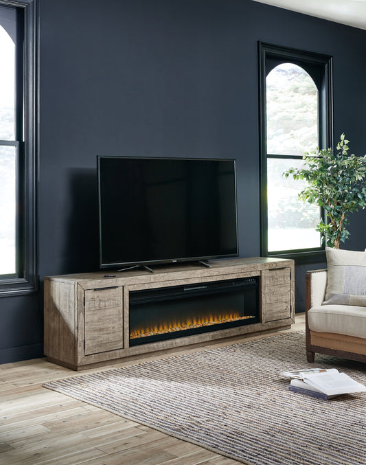 Bradenton Furniture Outlet - Ashley Furniture - Krystanza TV Stand with Electric Fireplace - TV Stand with Electric Fireplace / Weathered Gray - W760W1